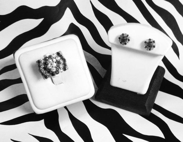 <b>Description: </b>14kt white gold ring set with 1.00 ct of black and white diamond.<br/><br/>14kt white gold earrings set with 2.00 ct of black and white diamond.