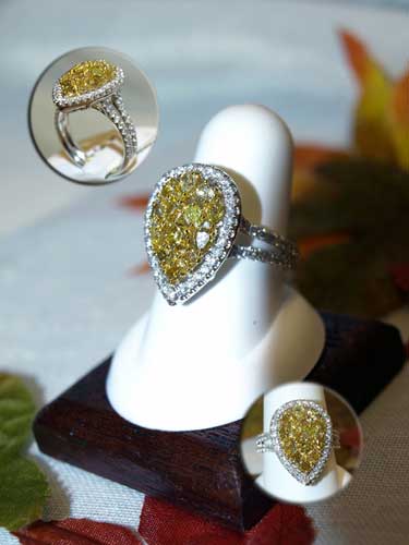 <b>Description: </b>14kt white gold yellow and white diamond ring