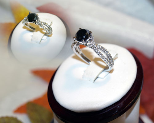 <b>Description: </b>white gold black and white diamond ring